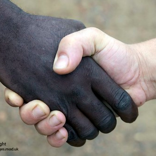 Two hands clasped together